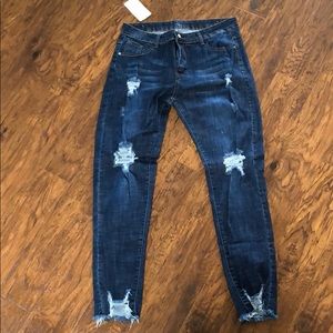 Color 3 distressed blue jeans large